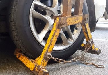 yellow car wheel clamp